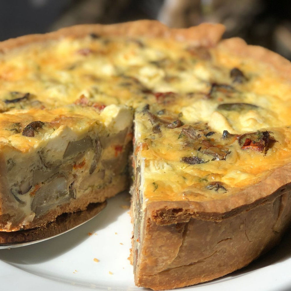 Madame Maxwell's Quiche au 100km Baked and Sliced